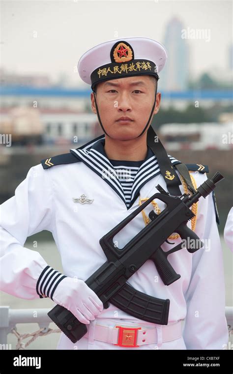 A Member Of The Chinese Navy Stands In An Honor Cordon For Secretary Of A Member Of The Chinese Navy Stands In An Honor Cordon For Secretary Of