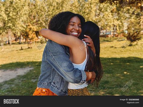 An Image Of Two People Hugging Each Other An Image Of Two People Hugging Each Other