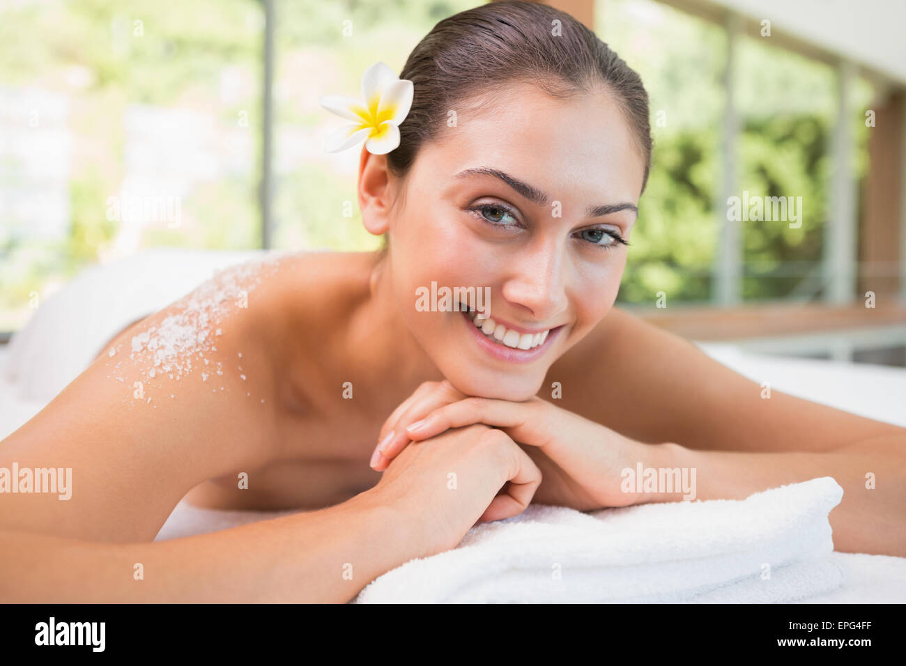 Beautiful Smiling Brunette Lying On Massage Table With Salt Scrub On Beautiful Smiling Brunette Lying On Massage Table With Salt Scrub On
