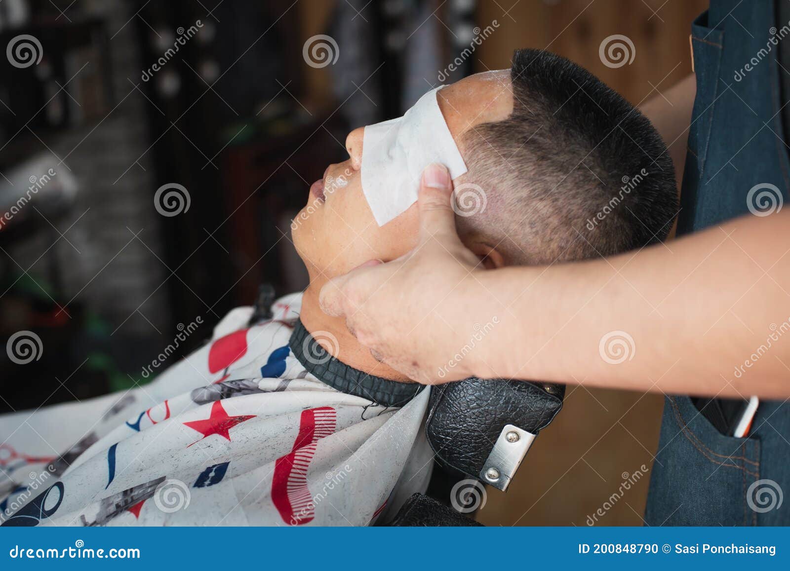 Man Receiving Massage On His Head After Finished Haircut By Man Receiving Massage On His Head After Finished Haircut By