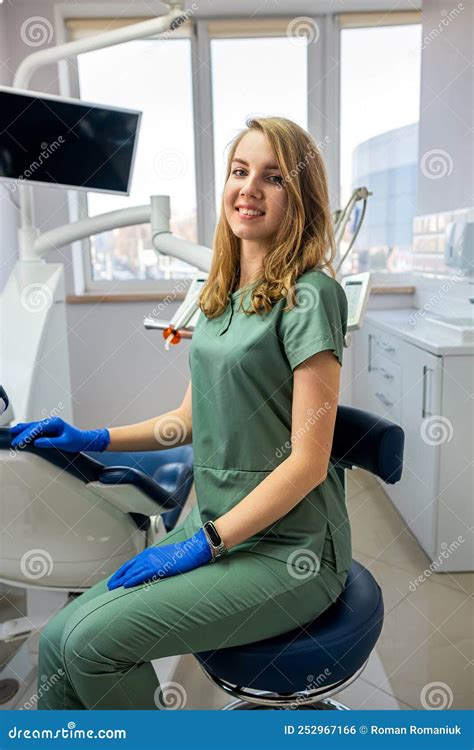 Portrait Of Pretty Female Dentist At Dental Clinic Stock Photo Image Portrait Of Pretty Female Dentist At Dental Clinic Stock Photo Image