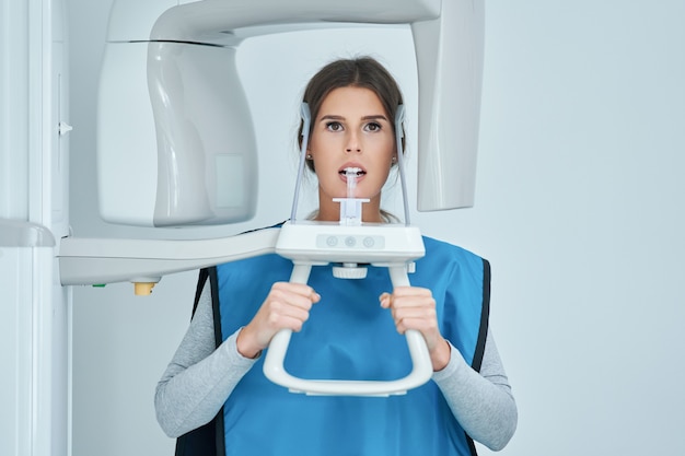 Premium Photo Dentist Taking A Panoramic Digital X Ray Of A Patient S Premium Photo Dentist Taking A Panoramic Digital X Ray Of A Patient S