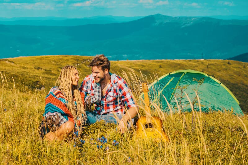 Romantic Couple On Camping Outdoor Adventure With Friends On Nature Romantic Couple On Camping Outdoor Adventure With Friends On Nature