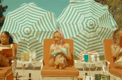Sabrina Carpenter Lounges Beachside In Retro Espresso Music Video Sabrina Carpenter Lounges Beachside In Retro Espresso Music Video