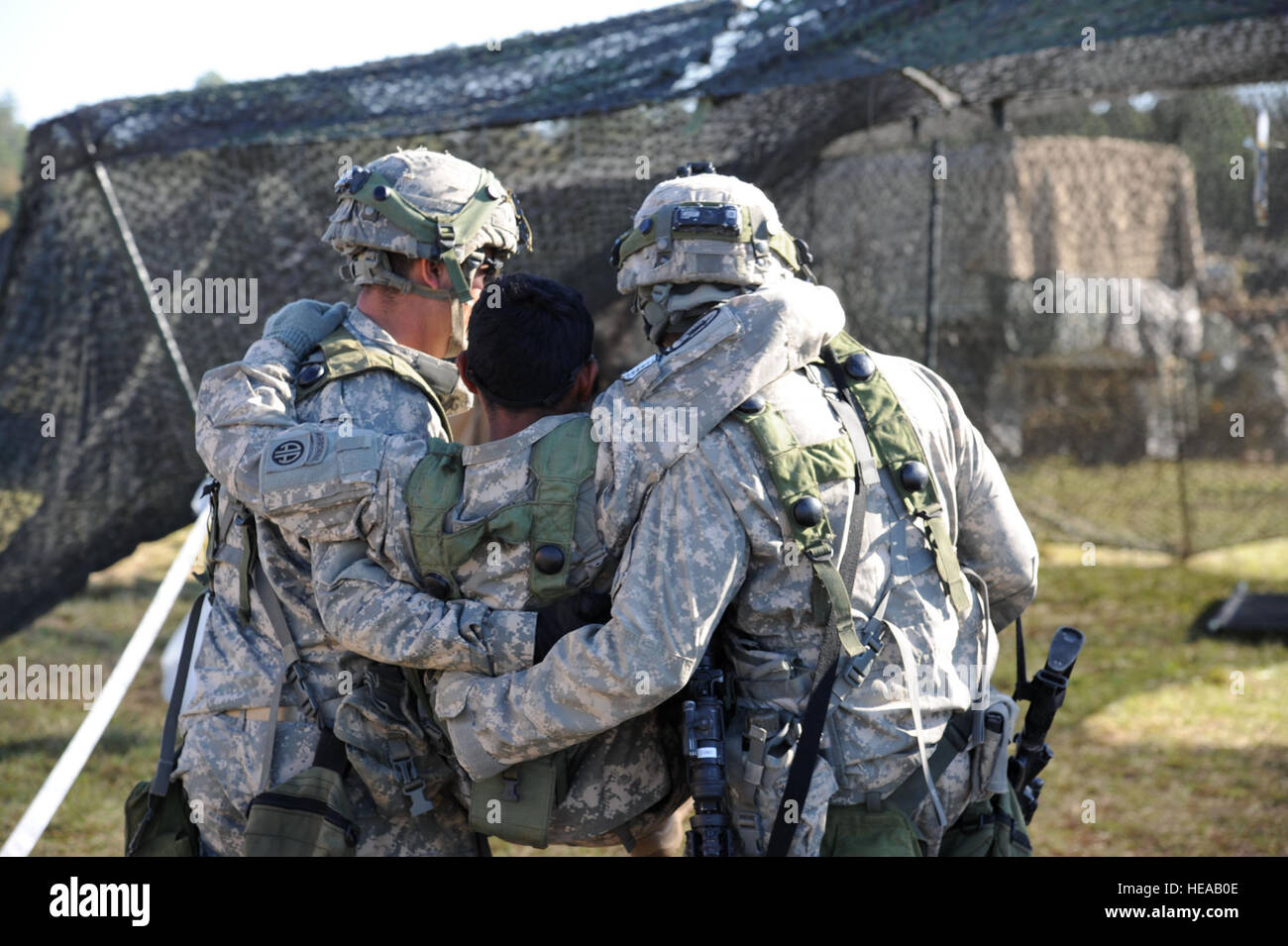 U S Army Medics Carry A Wounded Soldier Into Charlie Company Meds