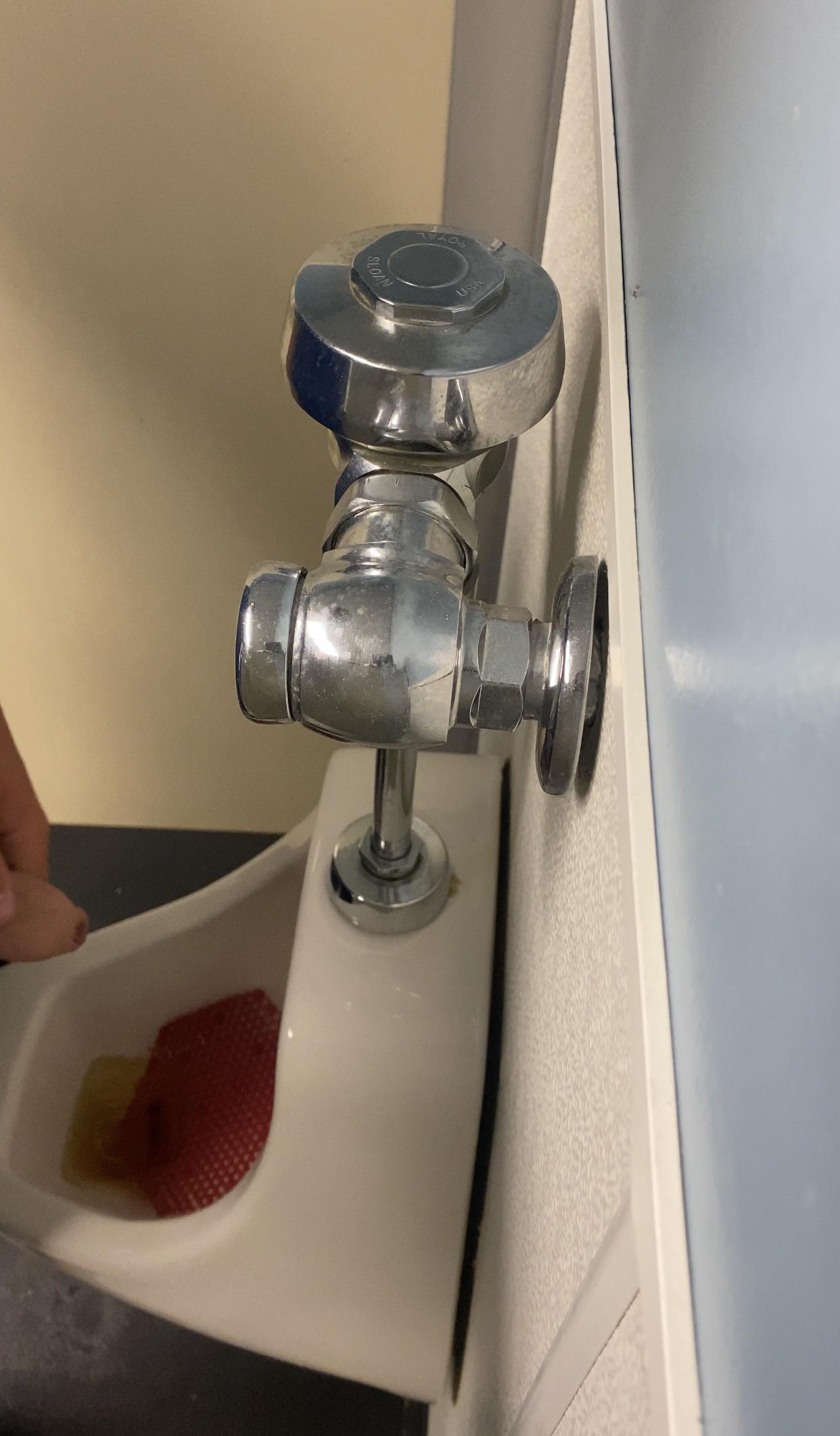 Unveiling the Urinal Spy Mystery