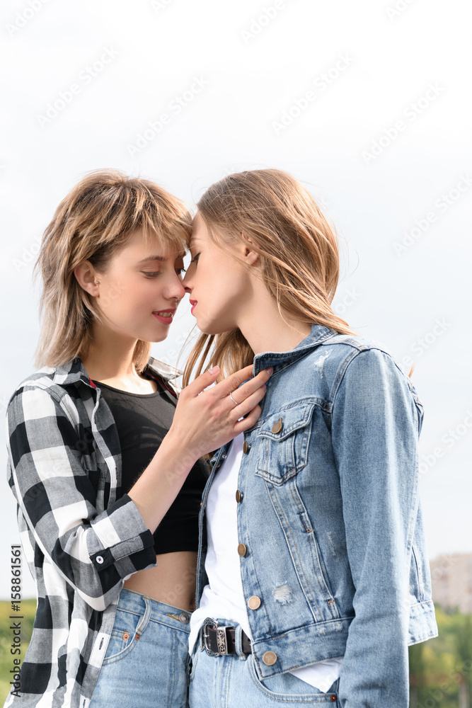 Young Lesbian Couple Hugging And Kissing Outdoors Stock Photo Image Young Lesbian Couple Hugging And Kissing Outdoors Stock Photo Image